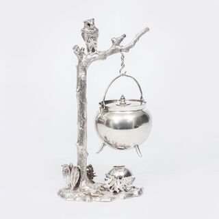 A Silver Tripod with Decorative Stand