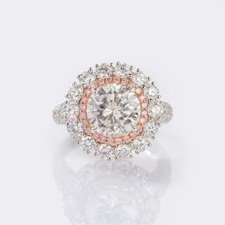 High-carat Diamond Solitaire Ring with Pink Diamonds