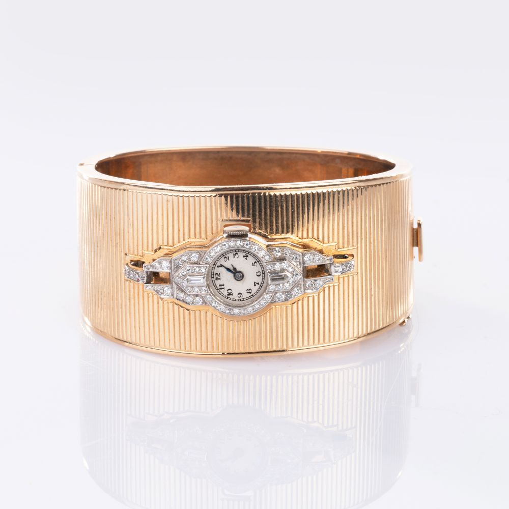 Art-déco Diamond Watch on a Gold Bangle Bracelet