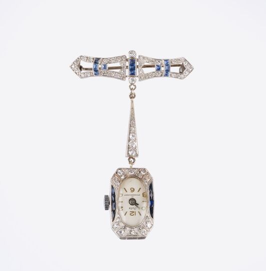 Art-déco Ladie's Pendant Watch on Brooch with Diamonds and Sapphires