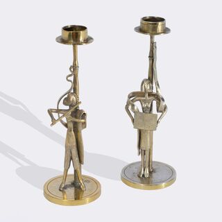 A Pair of Figural Candlesticks