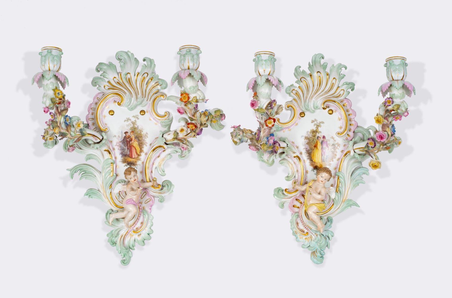 A Pair of Wall Lightings with Putti