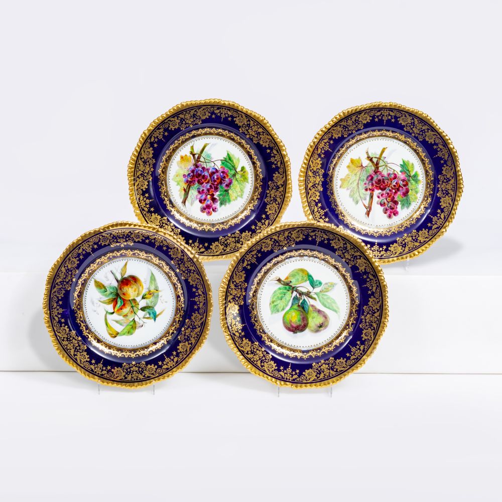 A Set of 4 Splendid Plates with fruits