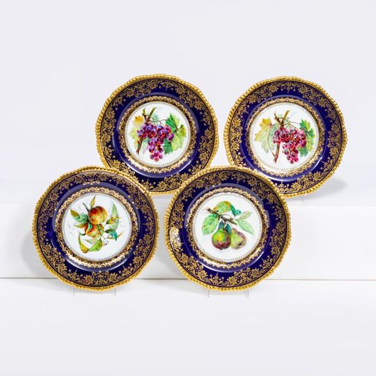 A Set of 4 Splendid Plates with fruits