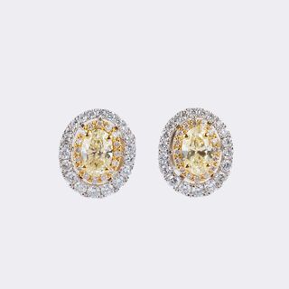 Pair of Fancy Diamond Earrings in Oval Shape