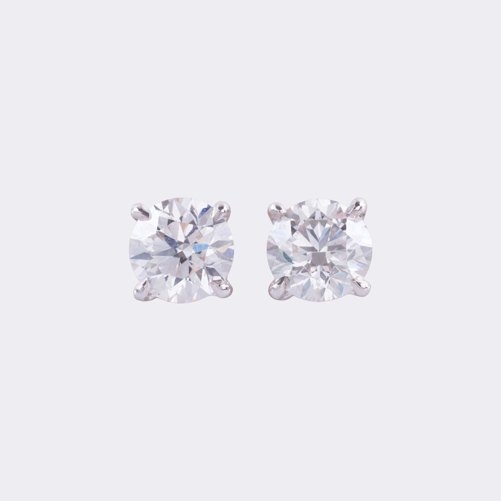 Pair of classic solitaire stud earrings