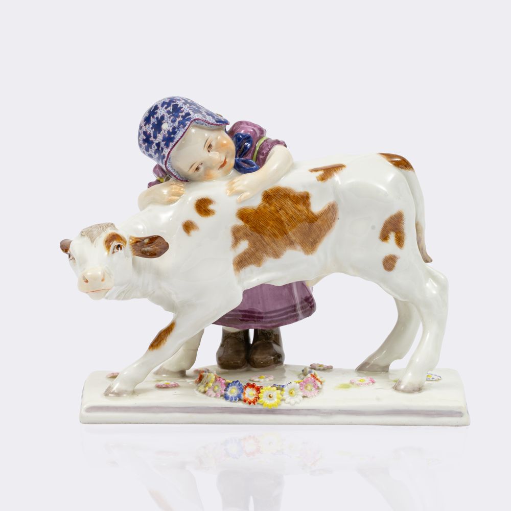Mädchen mit Kalb