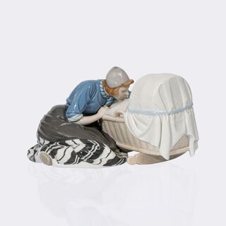 Holländische Mutter, an der Wiege sitzend