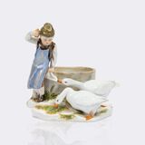 Knabe mit zwei Gänsen