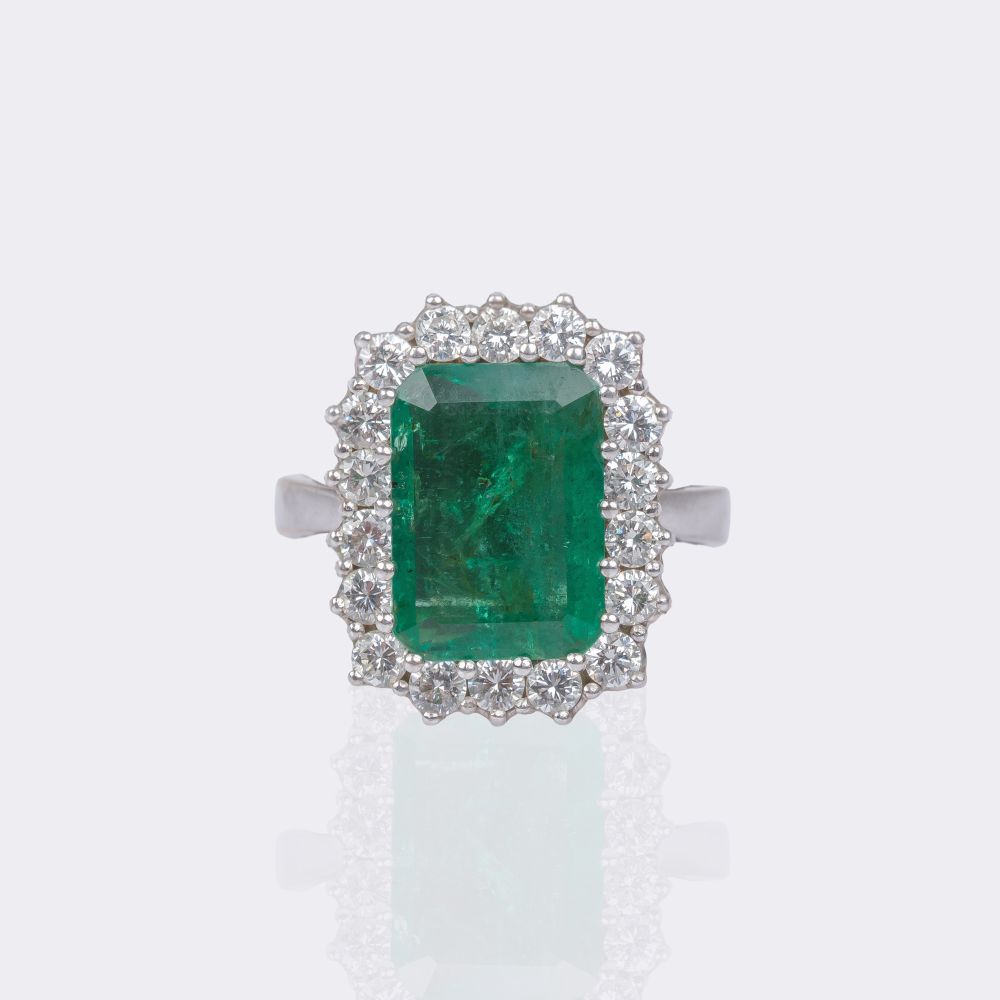 Emerald ring with diamond trim
