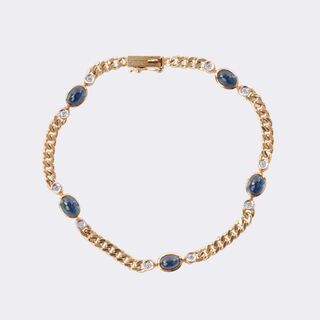 Panzerarmband mit Saphir-Cabochons und Brillant-Besatz