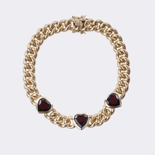  - Gold curb bracelet with garnet trim 'Heart'