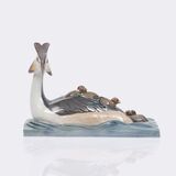A Great Crested Grebe with Chicks
