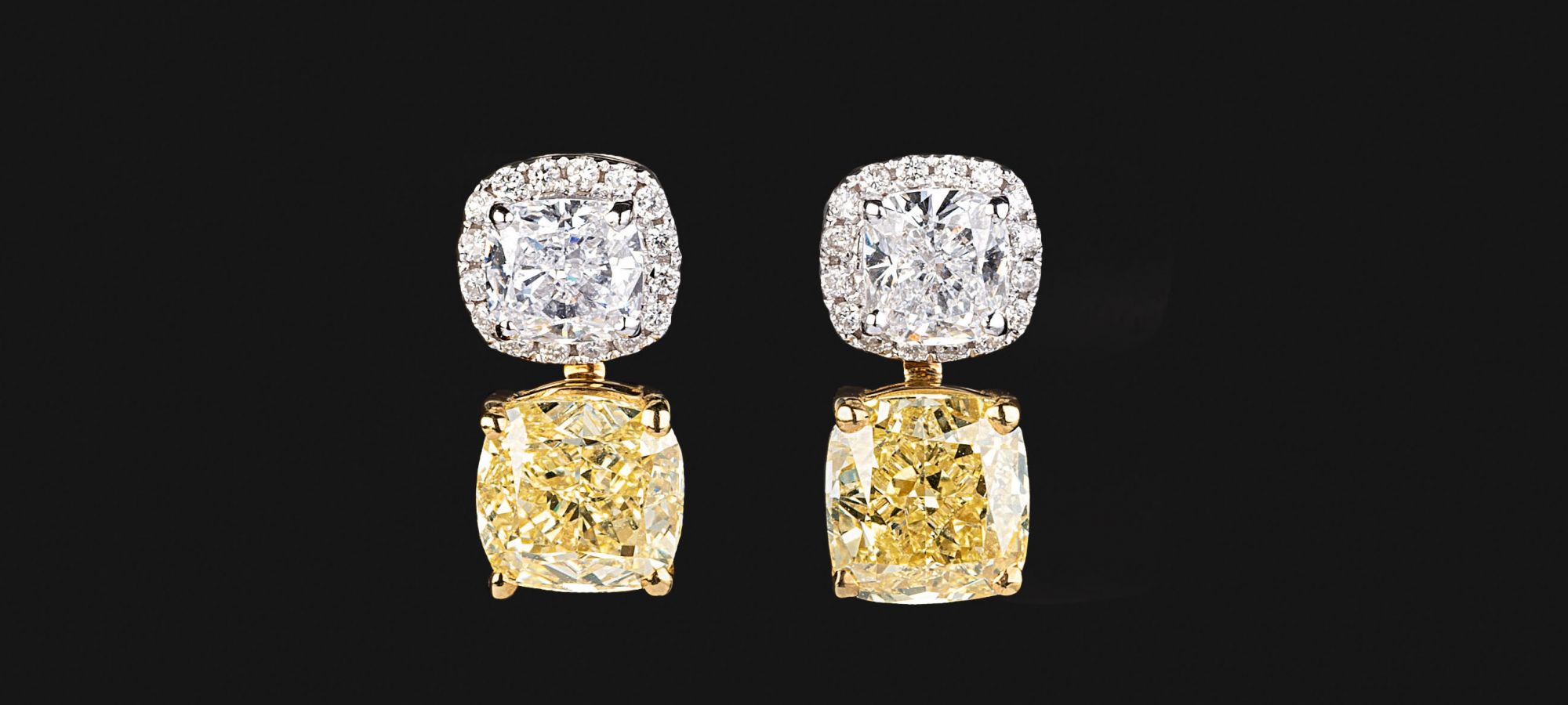 A Pair of Earstuds with River and Fancy Solitaire Diamonds