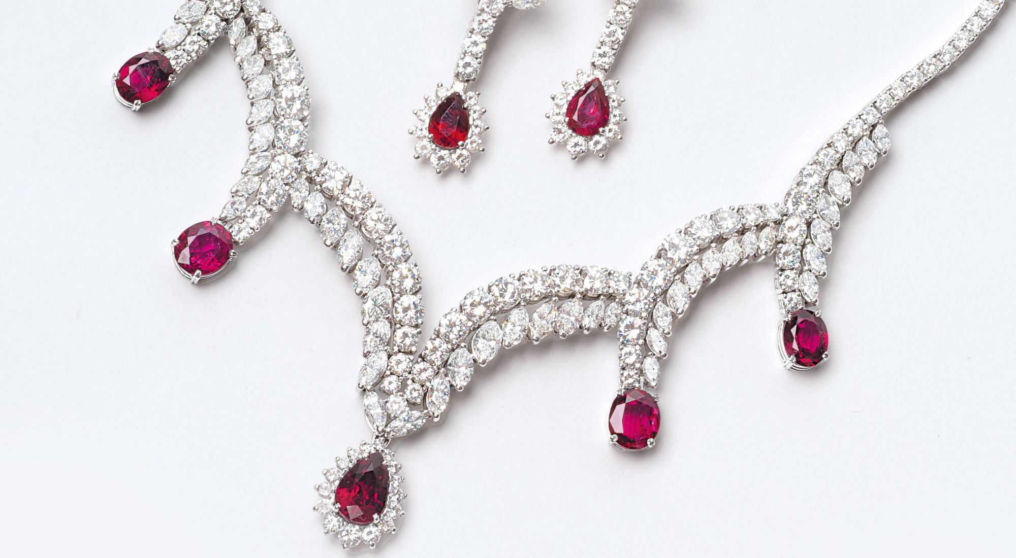 A 'Robe de gala' Demi Parure with naturals Rubies and fine white Diamonds